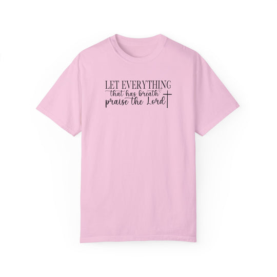Relaxed fit Let Everything That Has Breath Praise the Lord Tee in pink with black text. 100% ring-spun cotton, garment-dyed for coziness. Durable double-needle stitching, no side-seams for a tubular shape.