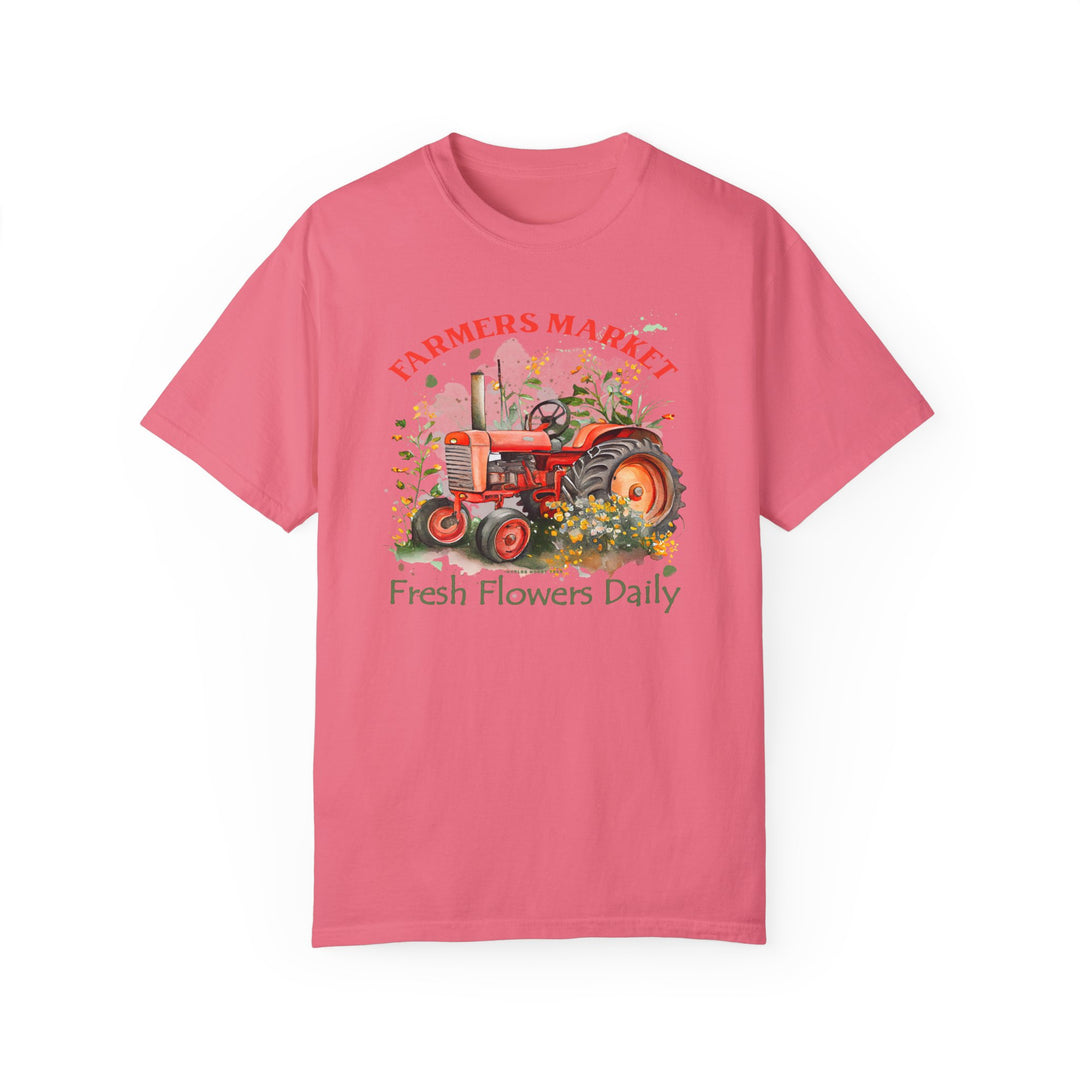 Fresh Flowers Tee: A pink shirt featuring a tractor design, made of 100% ring-spun cotton for a cozy feel. Relaxed fit with double-needle stitching for durability. From Worlds Worst Tees.