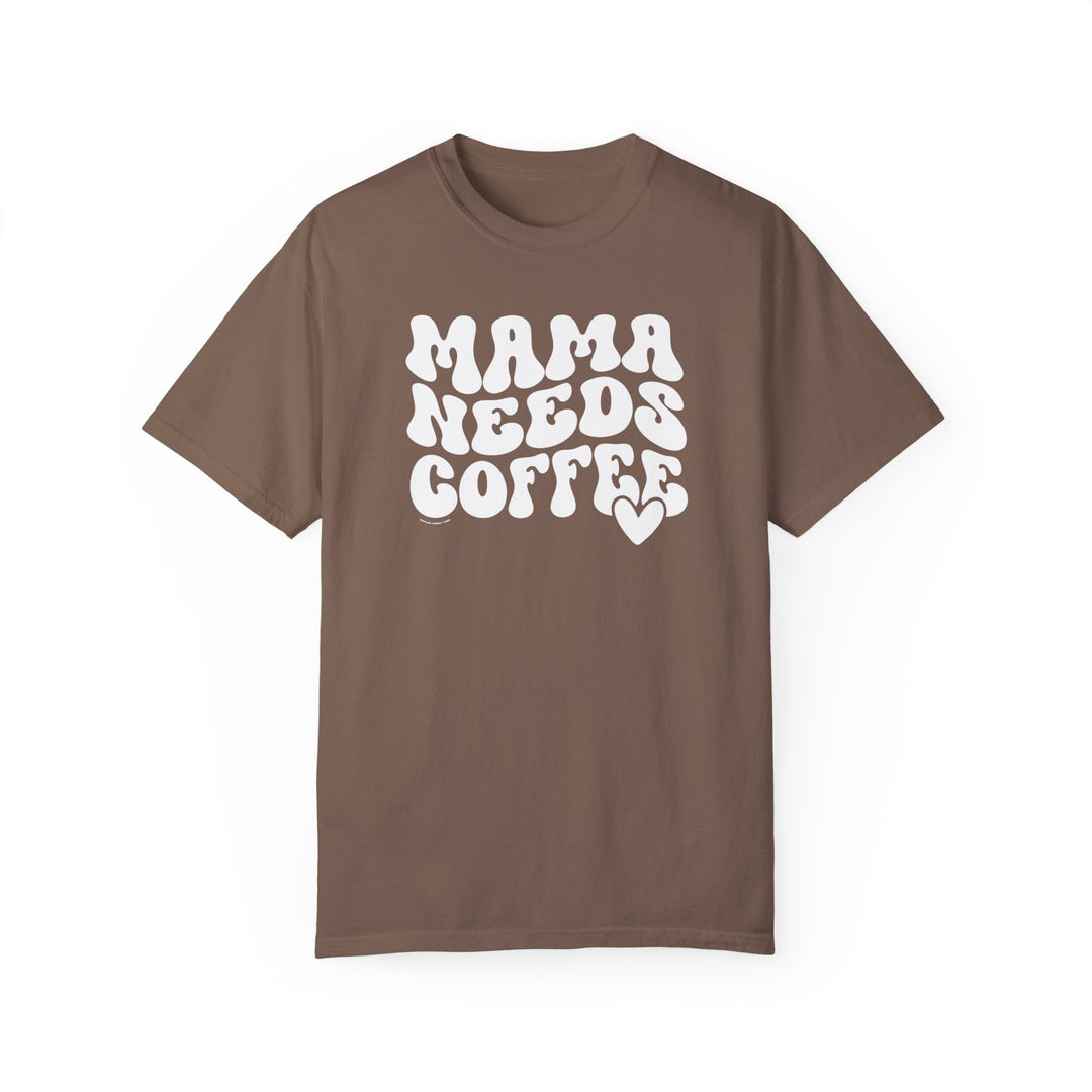 A cozy Mama Needs Coffee Tee, garment-dyed with ring-spun cotton. Features a relaxed fit, double-needle stitching, and seamless design for durability and comfort. Sizes: S-4XL.