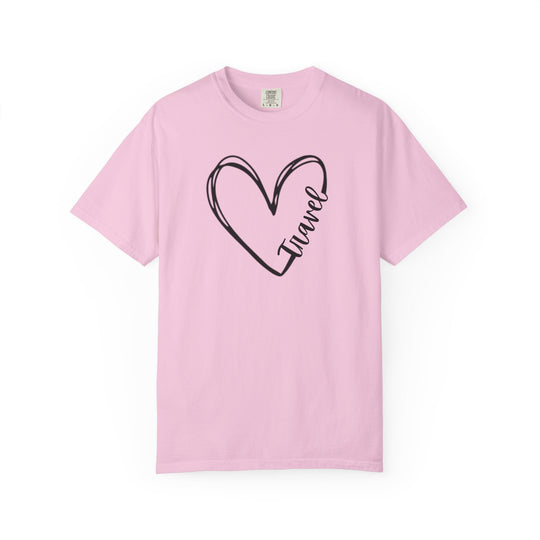Light pink Travel Tee with a hand-drawn heart outline and the word Travel, offering a cozy fit and durable Comfort Colors design.