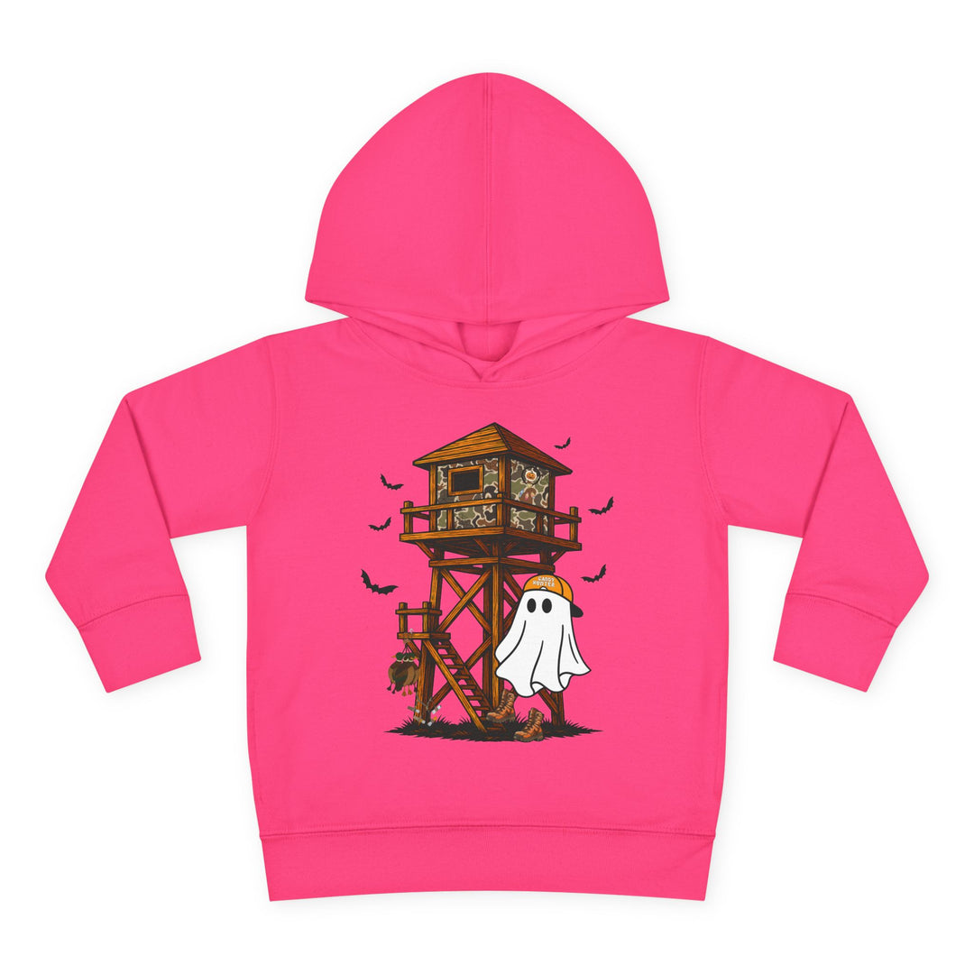 Ghost Hunter Toddler Hoodie with a Halloween-themed illustration of a lookout tower, bats, and a ghost with a pumpkin candy bucket, designed for comfort and durability.