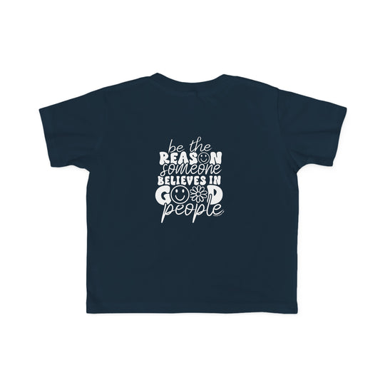 A toddler tee featuring a back view of a blue shirt with a logo, ideal for sensitive skin. Made of 100% combed ringspun cotton, light fabric, tear-away label, and a classic fit. Sizes: 2T, 3T, 4T, 5-6T.