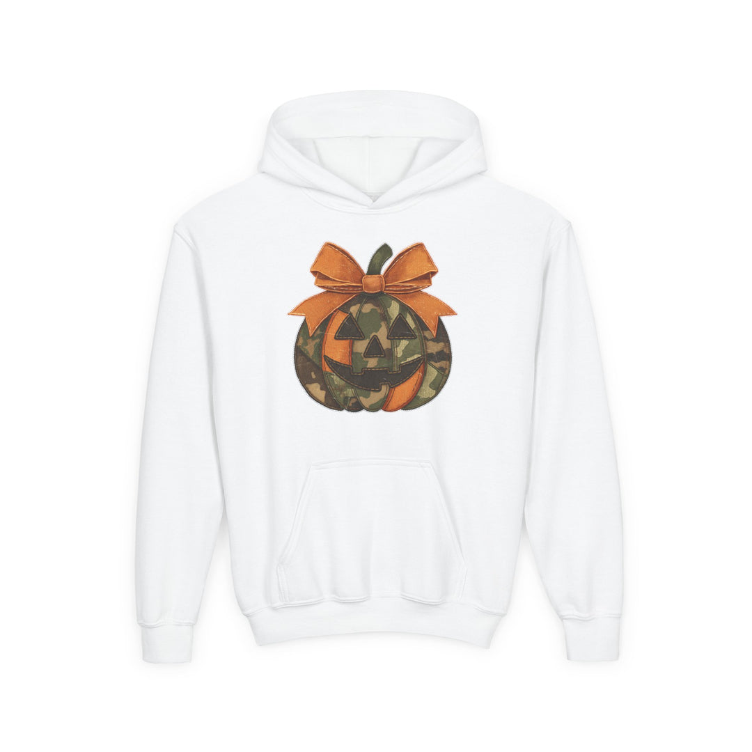 Jackie O Youth Hoodie featuring a camouflage jack-o’-lantern graphic with an orange bow on a white pullover, complete with a front kangaroo pocket.