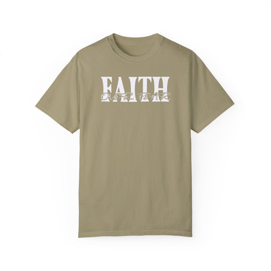 A tan Faith Over Fear Tee, crafted from 100% ring-spun cotton. Garment-dyed for extra coziness, featuring a relaxed fit, double-needle stitching, and seamless design for durability and comfort.