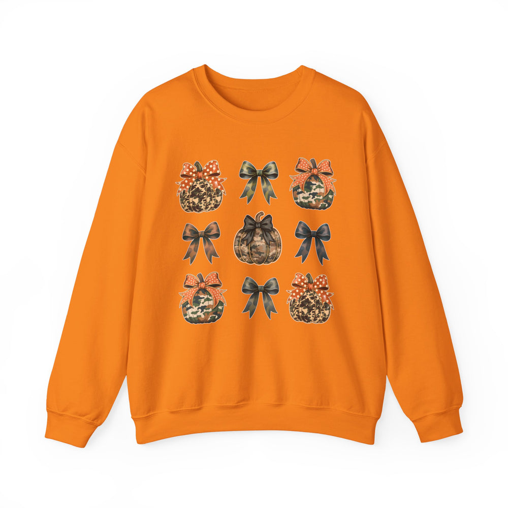 Bows and Pumpkins Crew: An orange sweatshirt featuring a 3x3 grid of fall-themed pumpkins and bows in camo and animal prints, combining autumn motifs with unique graphic style.