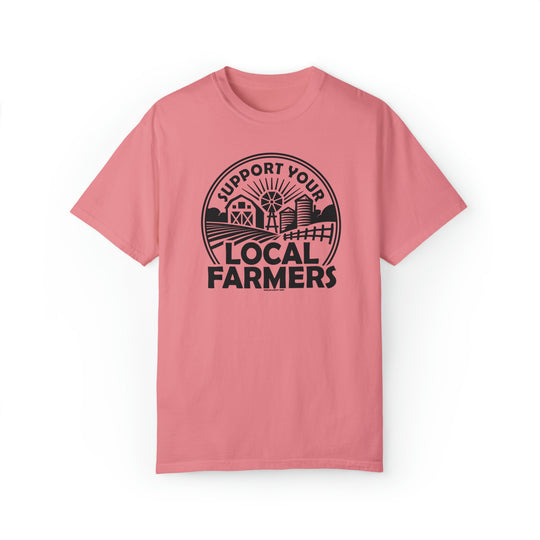 Unisex Support Your Local Farmer Tee, a pink t-shirt with a black logo. Made of 80% ring-spun cotton and 20% polyester, featuring a relaxed fit and rolled-forward shoulder for ultimate comfort and style.