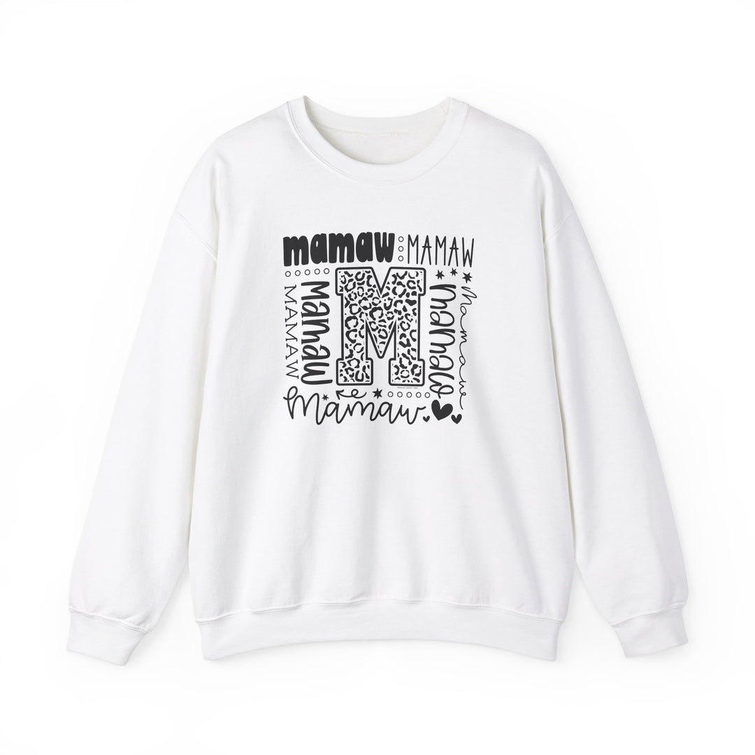 A Mamaw Crew unisex heavy blend crewneck sweatshirt in white with black letters, offering comfort and durability. Made from 50% cotton and 50% polyester fabric, featuring a ribbed knit collar and double-needle stitching for a classic fit.