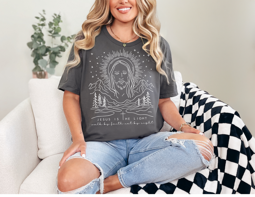 Jesus is the Light Tee, a classic unisex jersey short sleeve t-shirt, featuring soft cotton fabric and ribbed knit collars for enhanced shape and fit.