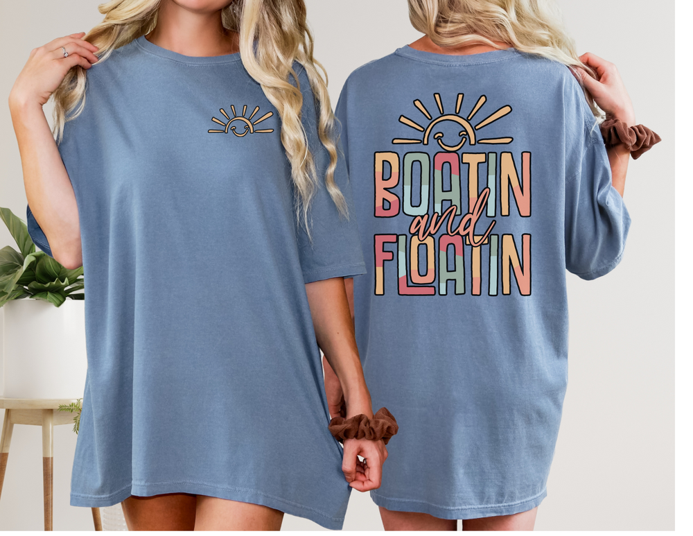 Boatin and Floatin Tee, a relaxed fit, garment-dyed t-shirt made of 100% ring-spun cotton, showcasing durable double-needle stitching and a classic crew neckline.