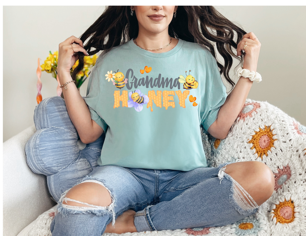 Grandma Honey Tee, a classic unisex jersey with ribbed knit collars, offers a comfortable fit and durable shape retention, perfect for casual and leisure wear.