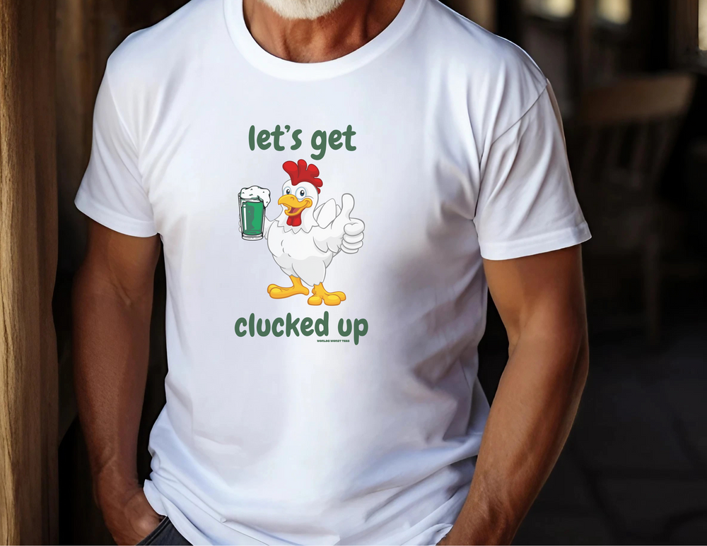 A man in a white Let's Get Clucked Up Tee, featuring a cartoon chicken holding a beer. Unisex heavy cotton tee with ribbed knit collar, tape shoulders, and no side seams for comfort. Sizes S to 5XL.