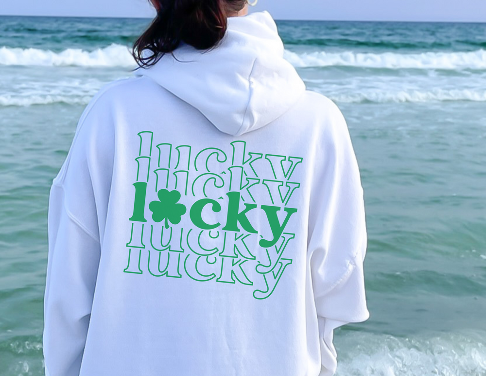 A Lucky Lucky Lucky Hoodie, a cozy unisex blend of cotton and polyester. Features a kangaroo pocket and matching drawstring. Ideal for chilly days. Classic fit, tear-away label, true to size.