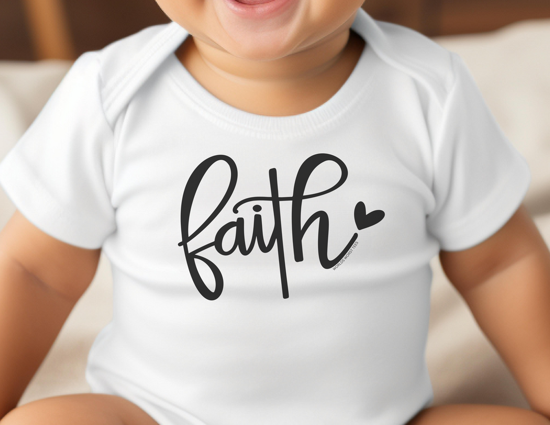 A baby wearing a white Faith Longsleeve Onesie bodysuit with plastic snaps for easy changing. Made of soft 100% combed ring-spun cotton for durability and comfort. Classic fit, suitable for infants.