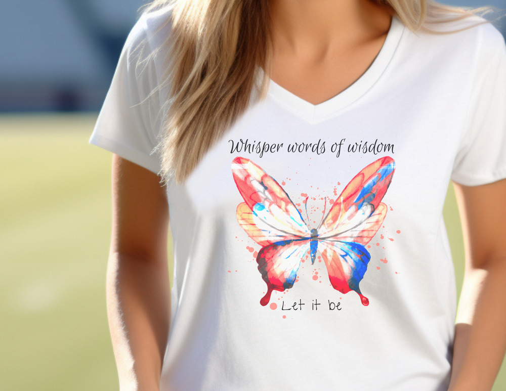 A woman in a white butterfly tee, ideal for active days. Whisper Words of Wisdom Tee: 100% polyester, v-neck cut, breathable, perfect for sports or outdoor activities.