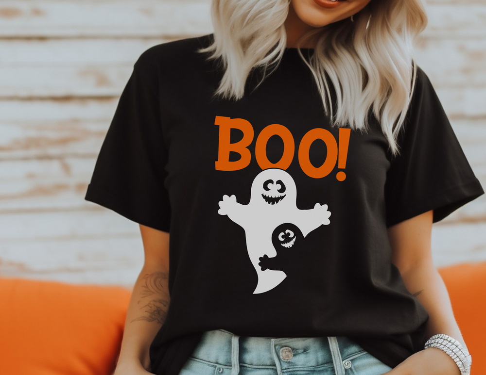 A unisex jersey tee featuring a ghost design, the Boo Tee. Made of soft cotton with ribbed knit collars, taping on shoulders, and dual side seams for durability. From Worlds Worst Tees.