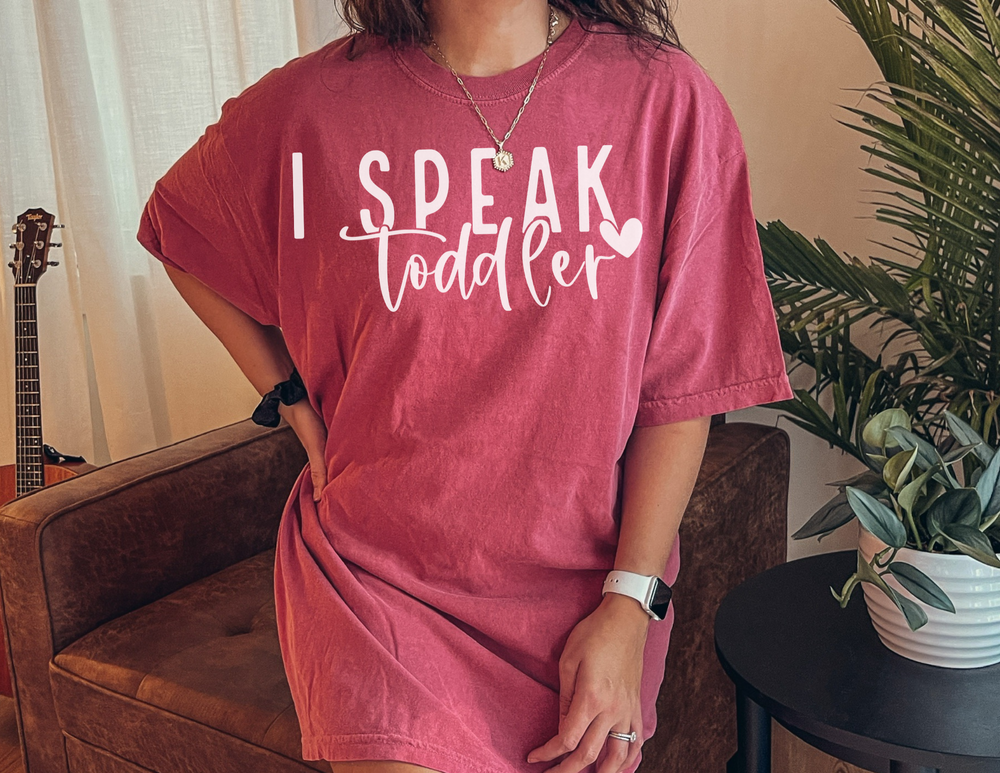 A relaxed fit I Speak Toddler Tee made of 100% ring-spun cotton for cozy daily wear. Garment-dyed with double-needle stitching for durability and a seamless look. From Worlds Worst Tees.