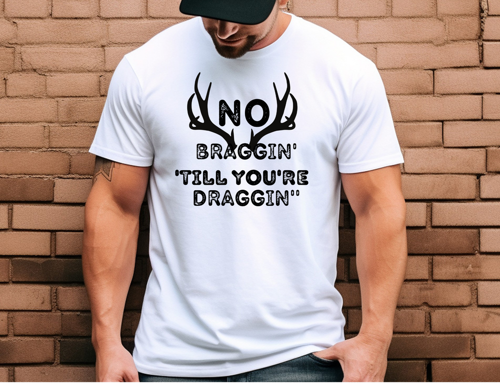 Unisex No Braggin' 'Till Draggin' Tee, a classic staple in heavy cotton. Seamless, durable, ribbed collar, and versatile sizing. Ideal for casual style from Worlds Worst Tees.