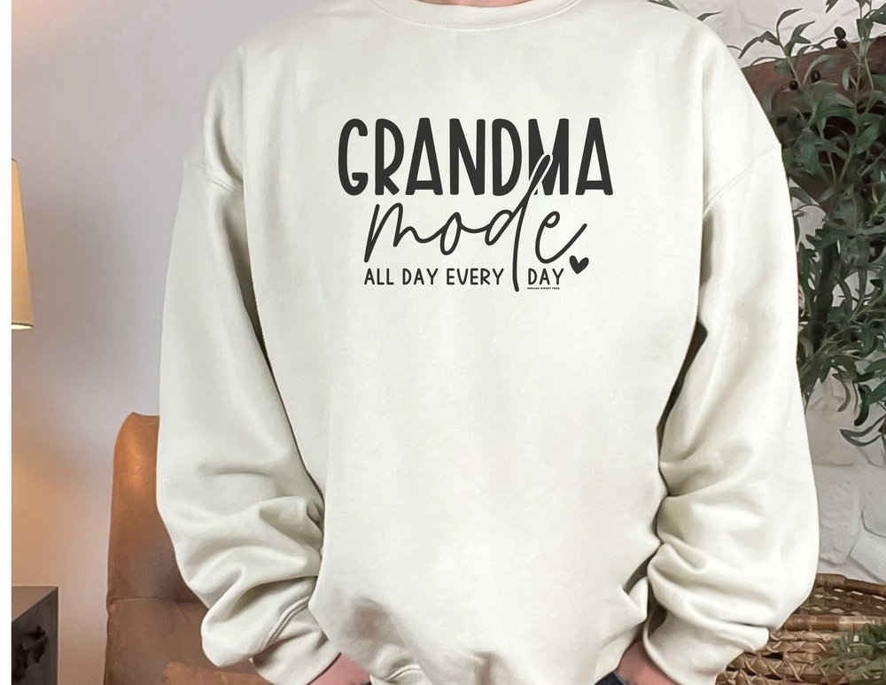 A unisex heavy blend crewneck sweatshirt, Grandma Mode Crew, in white. Made of 50% cotton and 50% polyester, featuring ribbed knit collar, no itchy side seams, and a loose fit. Sizes range from S to 5XL.