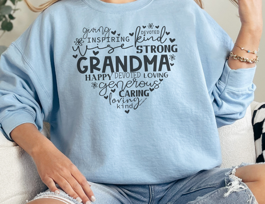 Unisex Grandma Crew sweatshirt in blue, featuring a relaxed fit and rolled-forward shoulder. Made of 80% ring-spun cotton and 20% polyester. Medium-heavy fabric with a 100% cotton face.