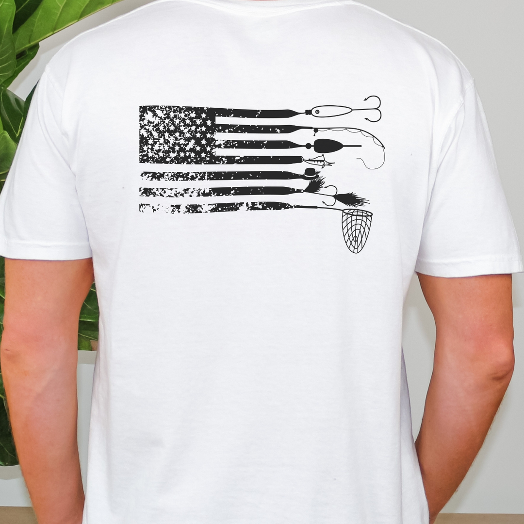A premium American Fisherman Tee, a comfy and light men's shirt with a flag and fishing hooks design. Ribbed knit collar, roomy fit, 100% cotton. Ideal for workouts or daily wear.