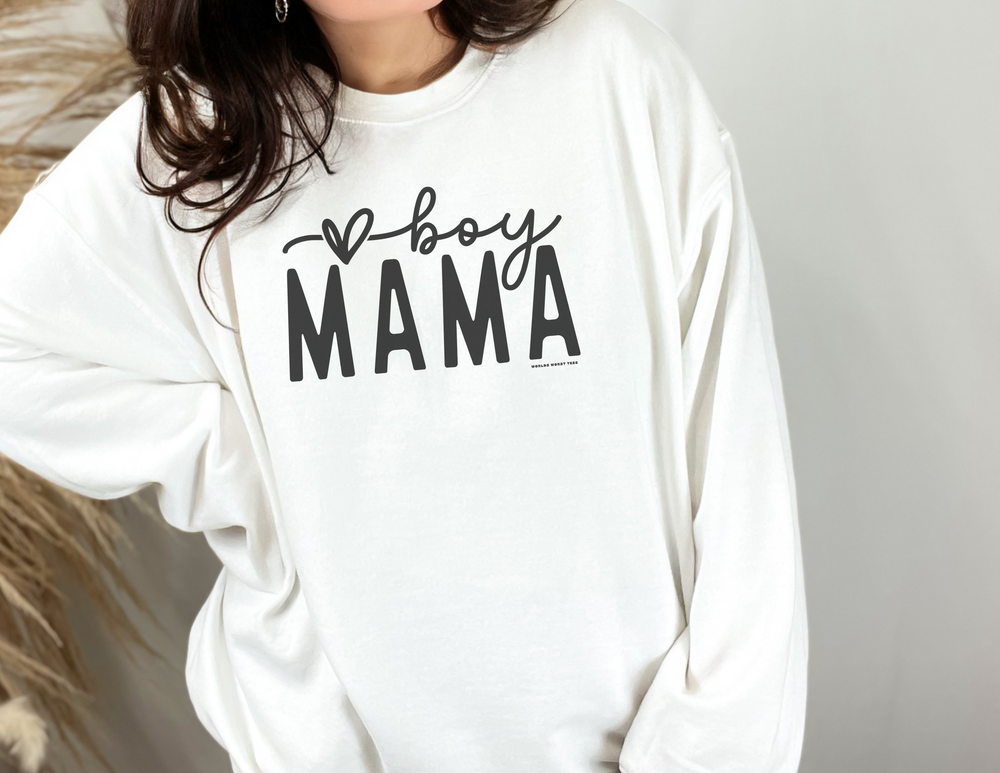 A unisex Boy Mama Crew heavy blend sweatshirt in white, featuring a ribbed knit collar for shape retention. Made of 50% cotton and 50% polyester, with a loose fit and no itchy side seams. Sizes from S to 5XL.