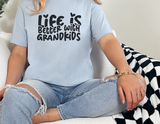 A relaxed fit Life is Better With Grandkids Tee in ring-spun cotton. Garment-dyed for coziness, with double-needle stitching for durability. Perfect for daily wear, featuring a tubular shape without side-seams.