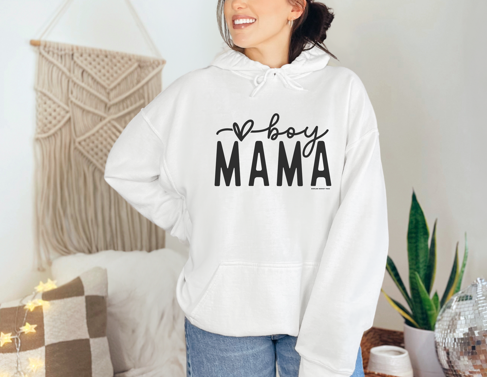 A woman in a white sweatshirt, showcasing the Boy Mama Hoodie from Worlds Worst Tees. Unisex heavy blend, cotton-polyester fabric for warmth. Kangaroo pocket and matching hood drawstring for style and practicality.