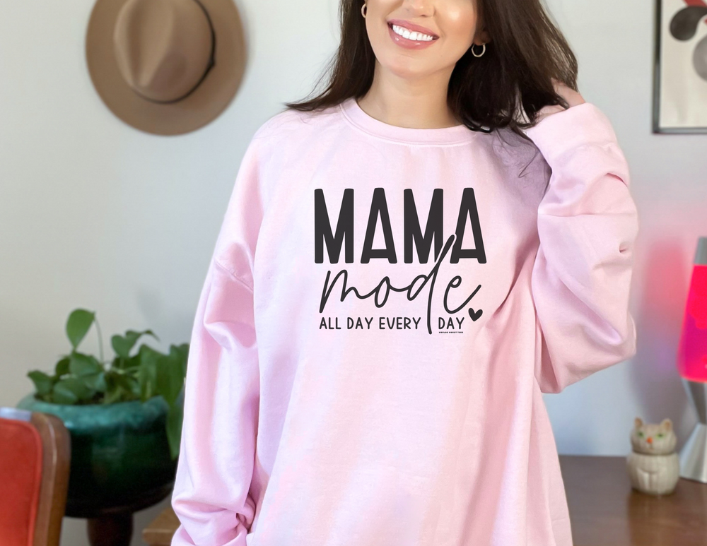 A Mama Mode Crew unisex heavy blend crewneck sweatshirt in various sizes. Made of 50% cotton and 50% polyester with ribbed knit collar and no itchy side seams. Medium-heavy fabric, loose fit, true to size.