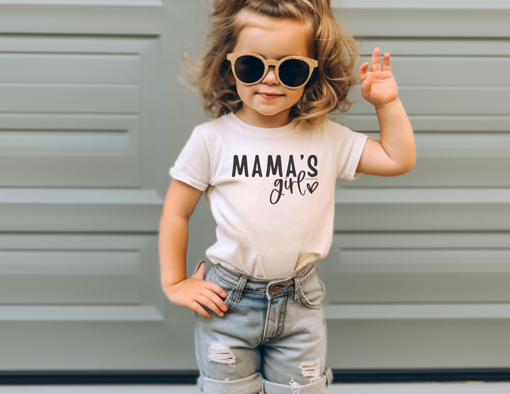 A toddler tee featuring a girl in sunglasses and a crown, perfect for Mama's Girl. Made of soft 100% combed ring spun cotton, light fabric, tear-away label, and a classic fit. Sizes 2T to 5-6T available.