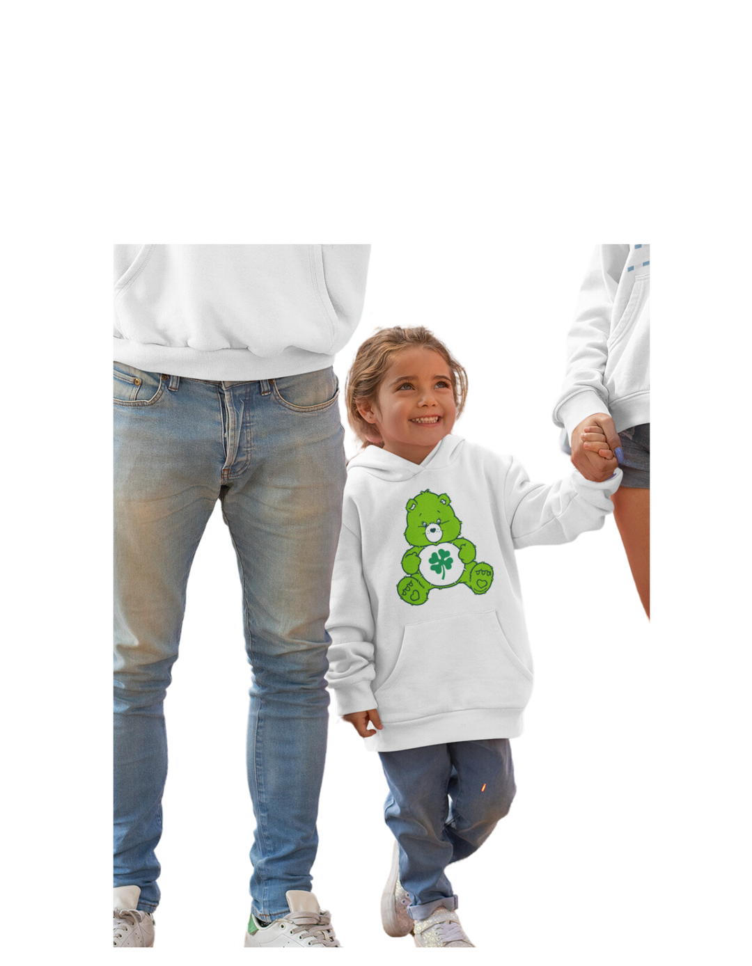 A Lucky Bear Youth Hoodie featuring a green teddy bear on a child holding hands with an adult. Made of soft cotton-polyester blend with kangaroo pocket and twill taping. Ideal for kids.
