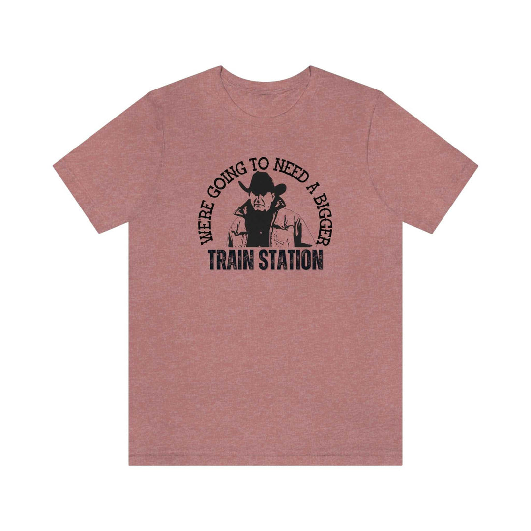 Fitted men’s tee, We're Going to Need a Bigger Train Station, featuring a cowboy graphic. Combed cotton, ribbed collar, roomy fit. Ideal for workouts or daily wear. From Worlds Worst Tees.