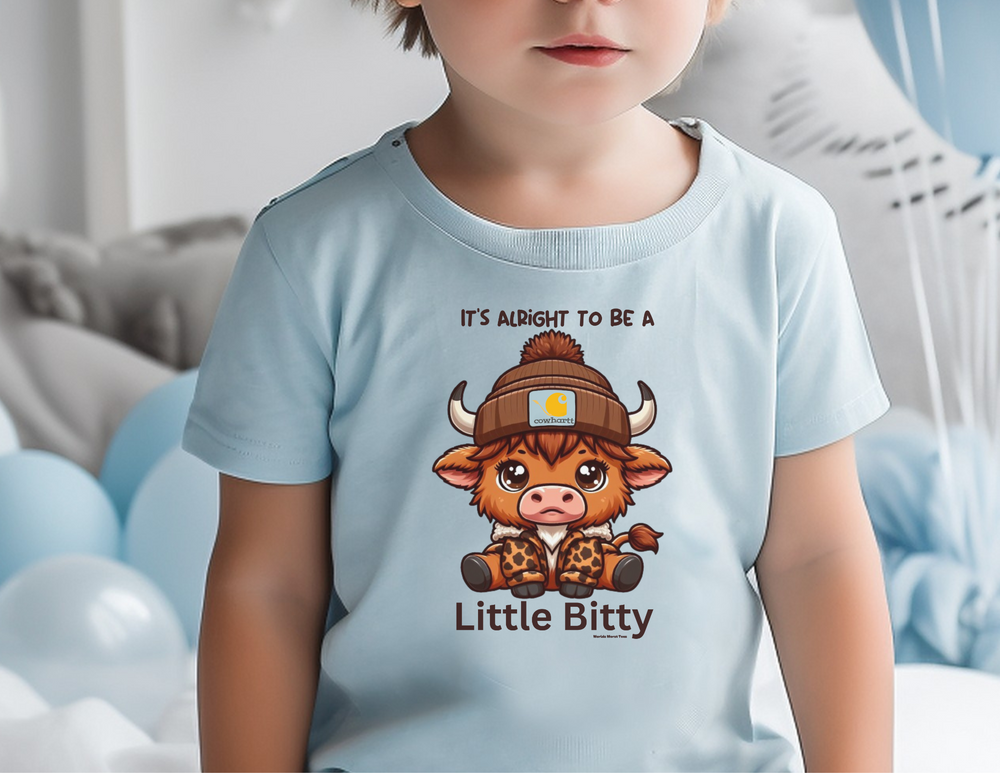 A Little Bitty Toddler Tee featuring a child in a white shirt. Made of 100% combed ringspun cotton, light fabric, tear-away label, and a classic fit. Sizes available: 2T, 3T, 4T, 5-6T.