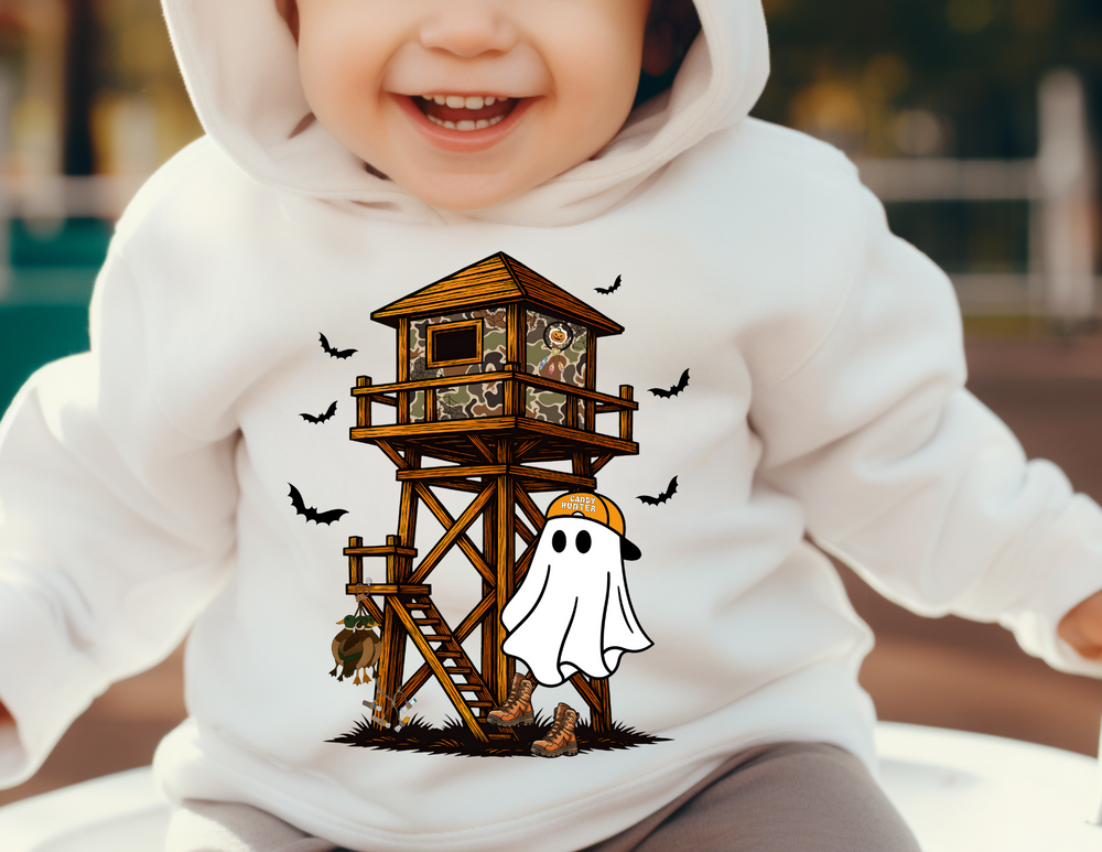 Candy Ghost Toddler Hoodie features a Halloween scene with a hunting tower, bats, a ghost in a Candy Hunter cap, and hunting accessories. Cozy, durable design for toddlers.