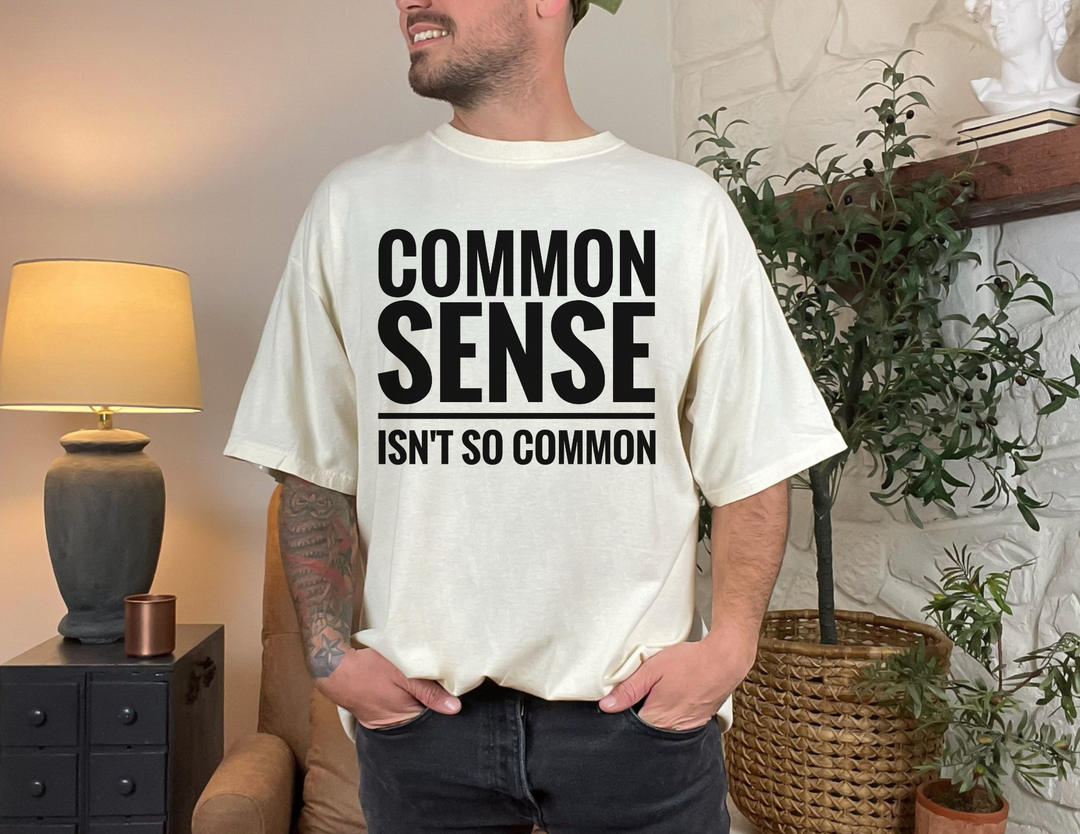 Common Sense Tee, a relaxed-fit, durable t-shirt made from soft, 100% ring-spun cotton, featuring a classic crew neckline and no side seams.