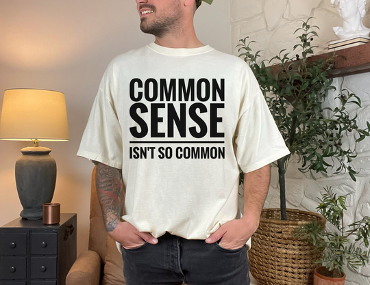 Common Sense Tee, a relaxed-fit, durable t-shirt made from soft, 100% ring-spun cotton, featuring a classic crew neckline and no side seams.