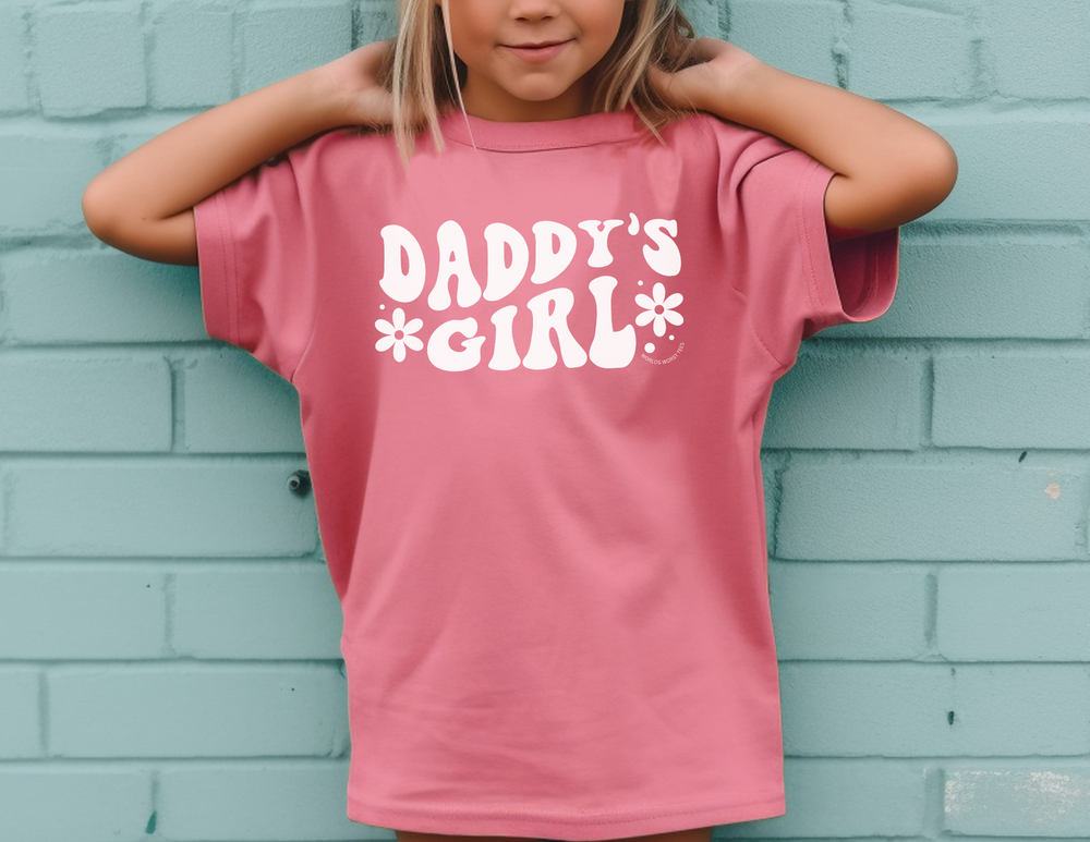 A Daddy's Girl Kids Tee, designed for active kids. 100% combed cotton, soft-washed, and garment-dyed. Classic fit for all-day comfort. Perfect for study or playtime.