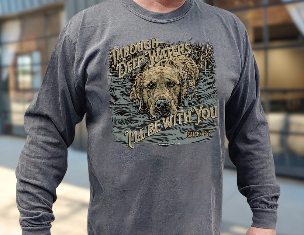 A man in a grey Through Deep Waters Long Sleeve T-Shirt, featuring a dog design. Made of 100% ring-spun cotton for softness and style. Perfect for casual comfort. From 'Worlds Worst Tees'.