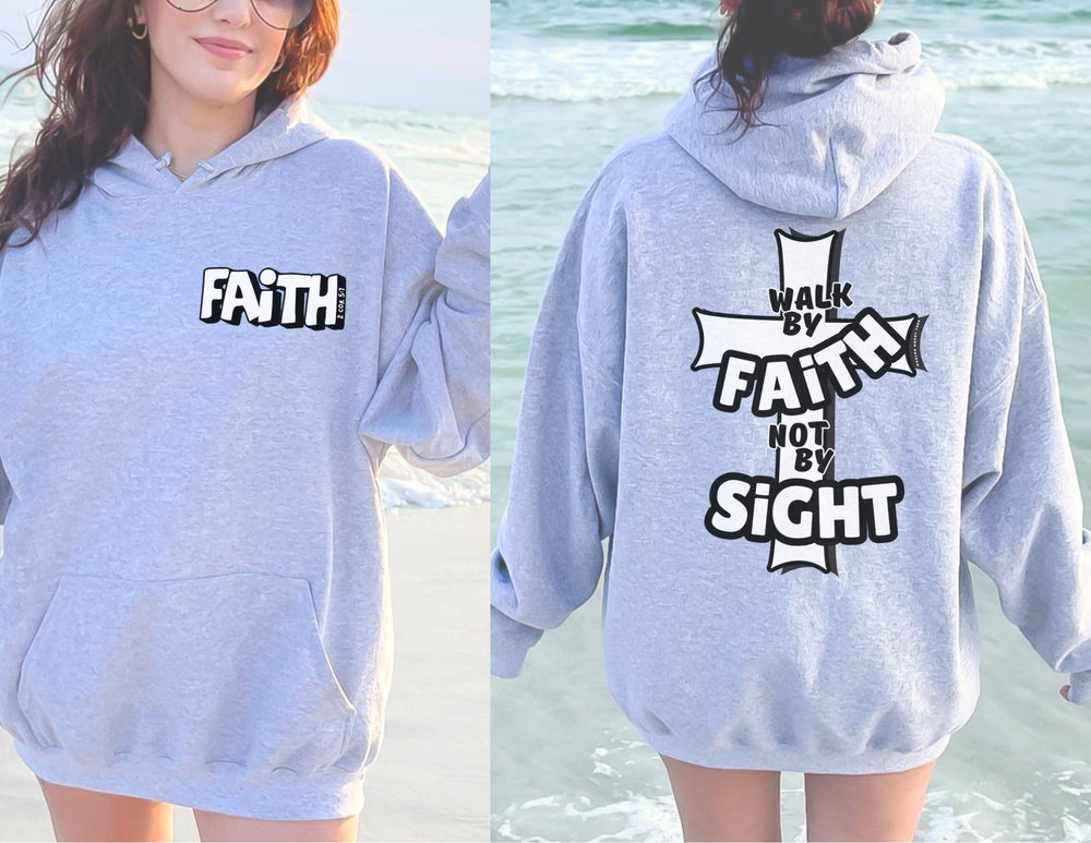 A grey hoodie with a cross design, ideal for relaxation. Unisex heavy blend, cotton-polyester fabric for warmth and comfort. Features kangaroo pocket and drawstring hood. Walk By Faith Not By Sight Crew.