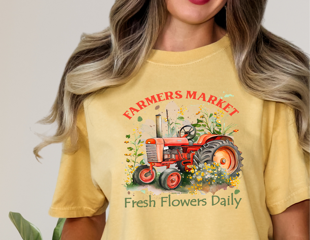 A relaxed fit Fresh Flowers Tee crafted from 100% ring-spun cotton. Garment-dyed for extra coziness, featuring double-needle stitching for durability and a seamless design for a tubular shape.