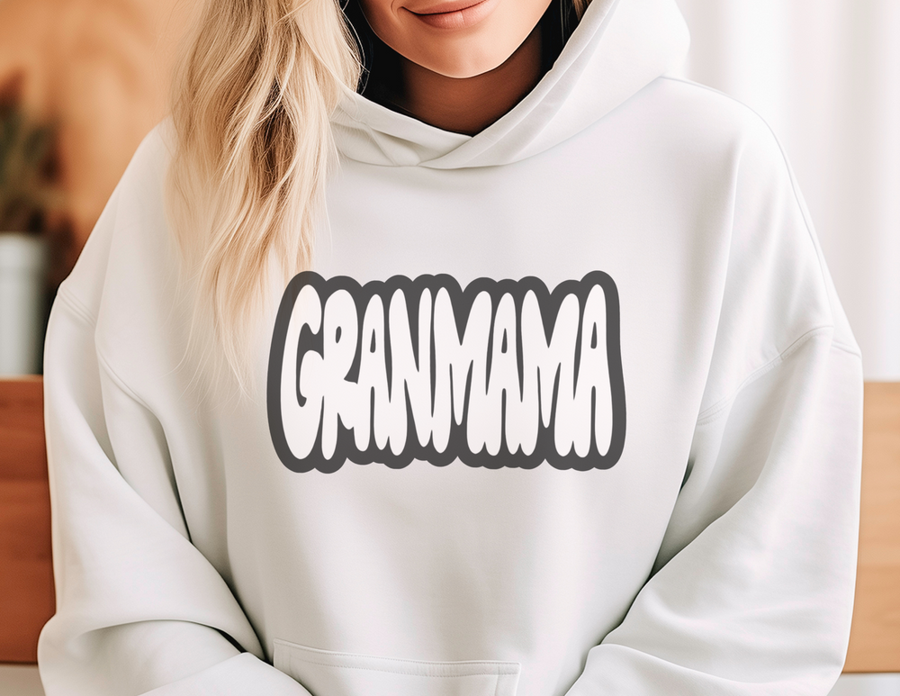 A cozy Granmama Hoodie in white, featuring a kangaroo pocket and matching drawstring. Unisex, made of 50% cotton and 50% polyester for warmth and comfort. Classic fit, tear-away label, runs true to size.
