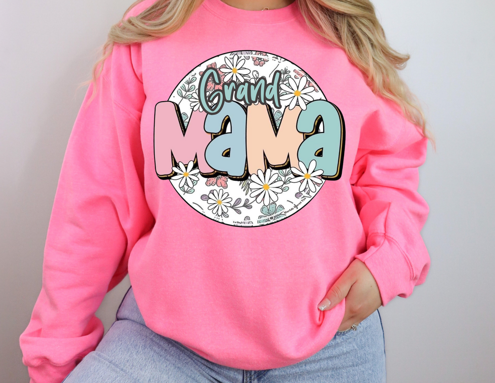 A heavy blend crewneck sweatshirt featuring a Sassy Grand Mama Flower design. Unisex, 50% cotton, 50% polyester, ribbed knit collar, no side seams, loose fit, medium-heavy fabric. Ideal comfort for all occasions.