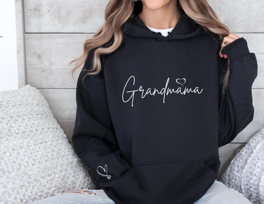 A cozy Grandmama Hoodie, a blend of cotton and polyester, featuring a kangaroo pocket and drawstring hood. Unisex, classic fit, tear-away label, ideal for printing. Medium-heavy fabric for warmth and comfort.