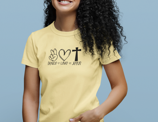A premium fitted men's short sleeve tee featuring Peace Love Jesus design. Comfy, light, and roomy with ribbed knit collar for elasticity. Crafted from 100% combed, ring-spun cotton for a premium fit.