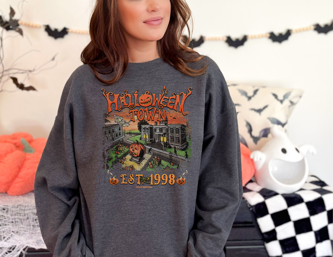 A cozy Halloweentown Crew unisex sweatshirt in grey, featuring a ribbed knit collar for shape retention. Made of 50% cotton and 50% polyester, with a loose fit and no itchy side seams.