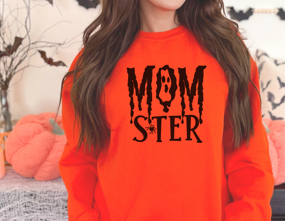 A Momster Crewneck sweatshirt in various sizes, featuring a ribbed knit collar for shape retention. Made of 50% cotton and 50% polyester, with a loose fit for comfort. Ideal for any occasion.