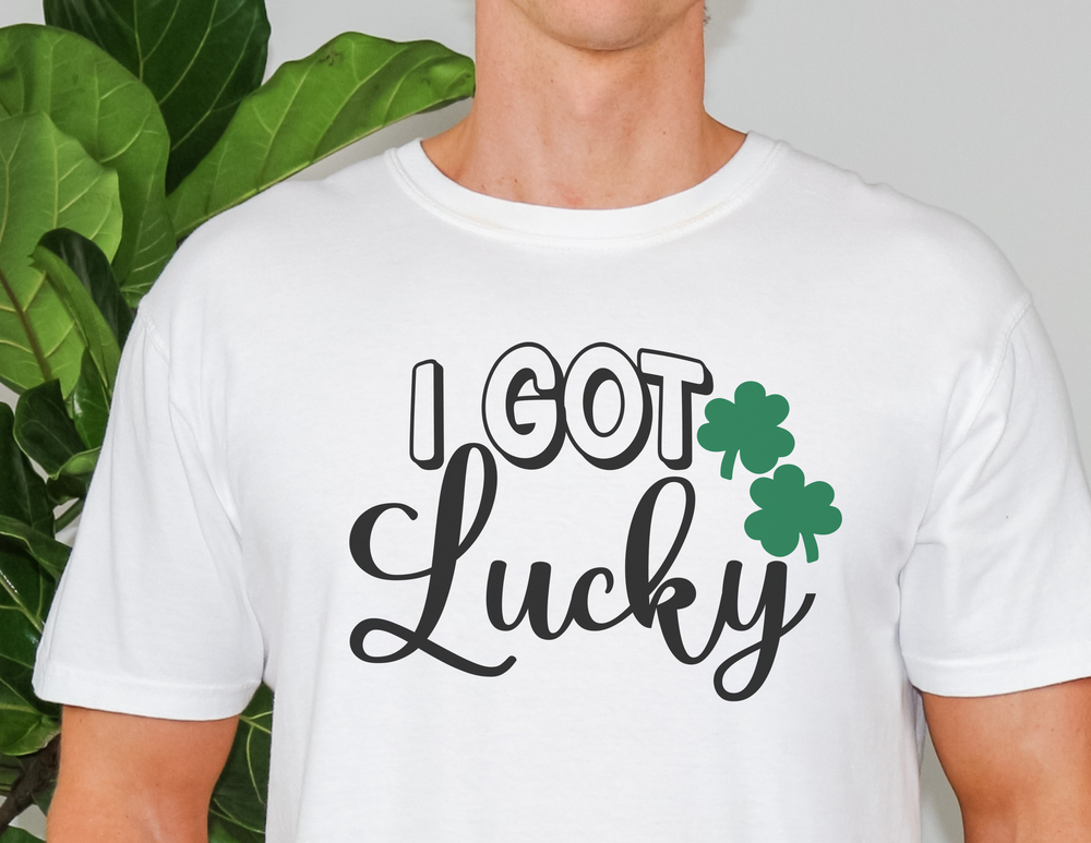 A man in a white Got Lucky Tee with a green leaf, showcasing a classic fit unisex heavy cotton tee. No side seams for comfort, ribbed knit collar for elasticity. Sizes from S to 5XL.