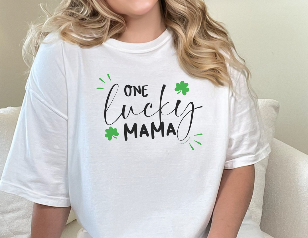 A relaxed fit One Lucky Mama Tee, made of 100% ring-spun cotton for extra coziness. Garment-dyed with double-needle stitching for durability and a tubular shape. Sizes from S to 4XL.