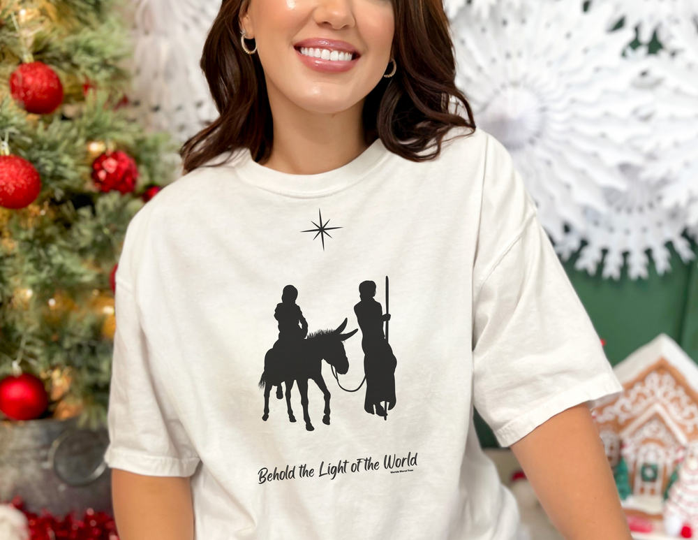 A classic unisex jersey tee featuring a joyful woman smiling, embodying the light of the world. Soft cotton, quality print, and ribbed knit collars for comfort and style. Sizes XS to 5XL.
