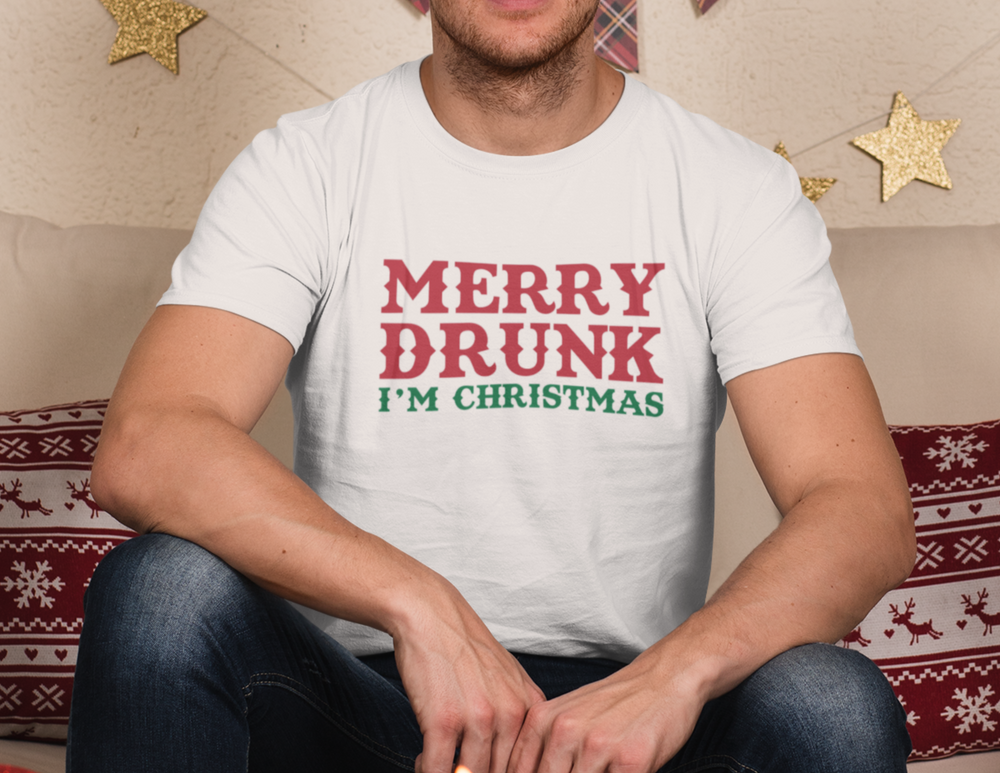 A premium Merry Drunk I'm Christmas Tee for men, featuring a comfy, light fit with ribbed knit collar and side seams for structural support. Made of 100% combed, ring-spun cotton.