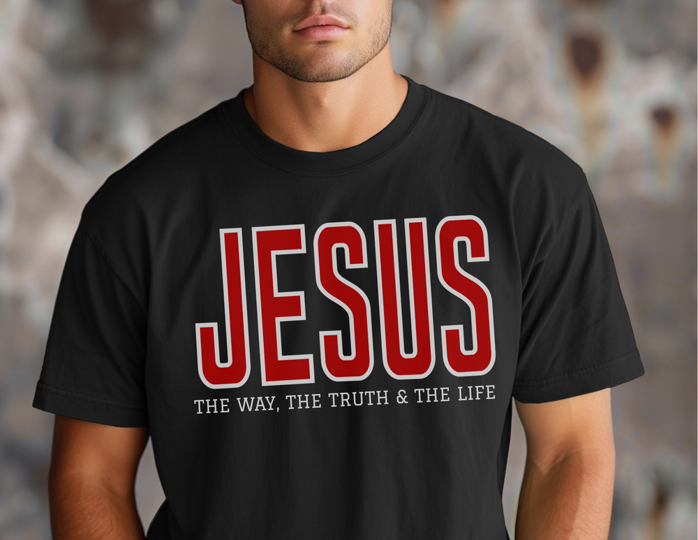 Person wearing a black Jesus the Way, the Truth, the Life Tee with red-and-white lettering, showcasing a relaxed fit and durable design.
